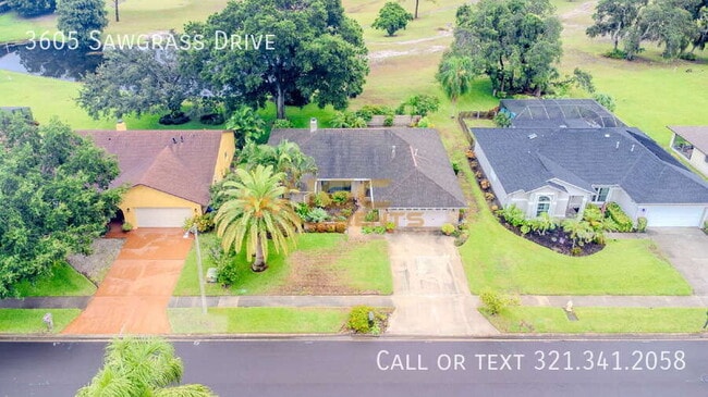 Building Photo - 3605 Sawgrass Dr