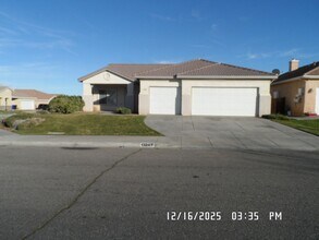 Building Photo - 4 Bedrooms, 2 Bathrooms, 3 Car Garage, 1899 sq. ft., Large Fenced, Front Yard Lawn, Near Schools ...