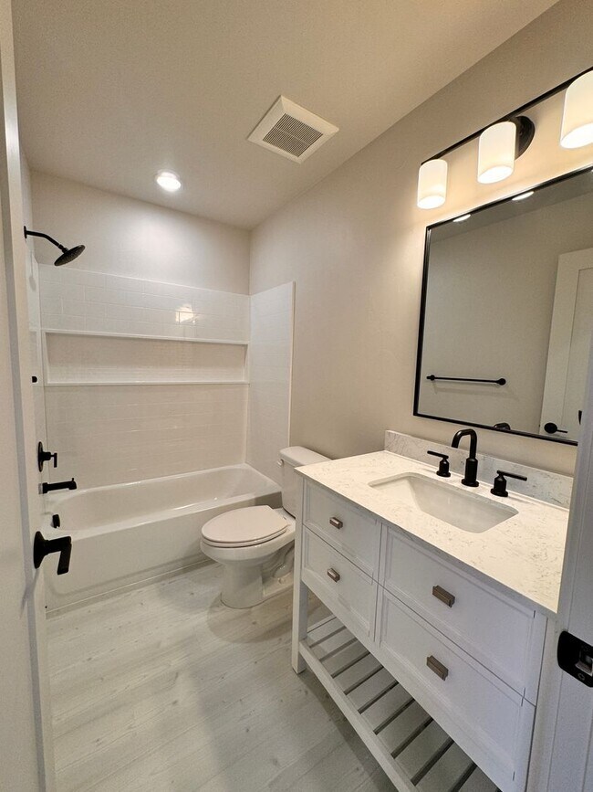Building Photo - Modern, Spacious 3-Bedroom Townhome in the...