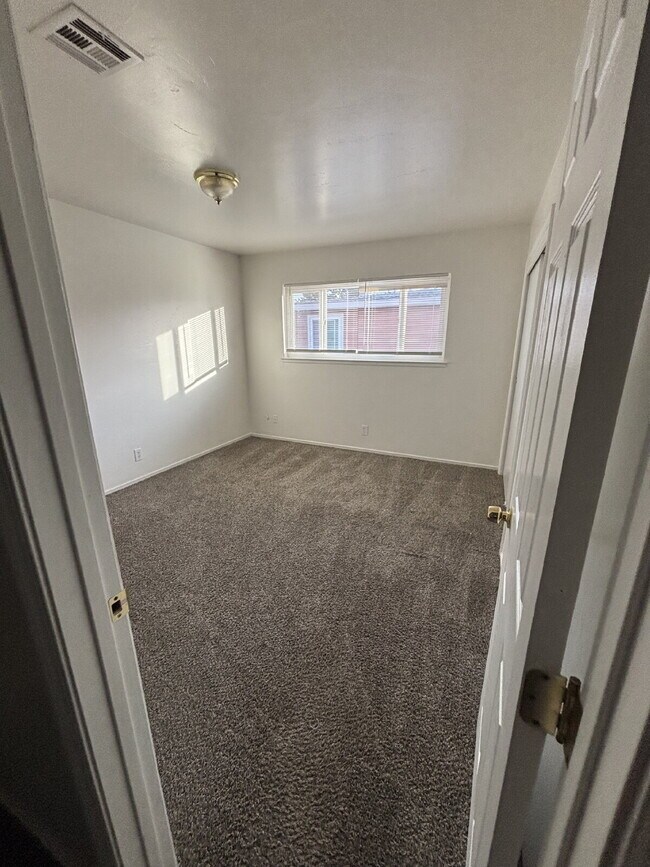 Building Photo - Updated interior - must see! Parking On Site - Laundry On Site - Coming in August 2026