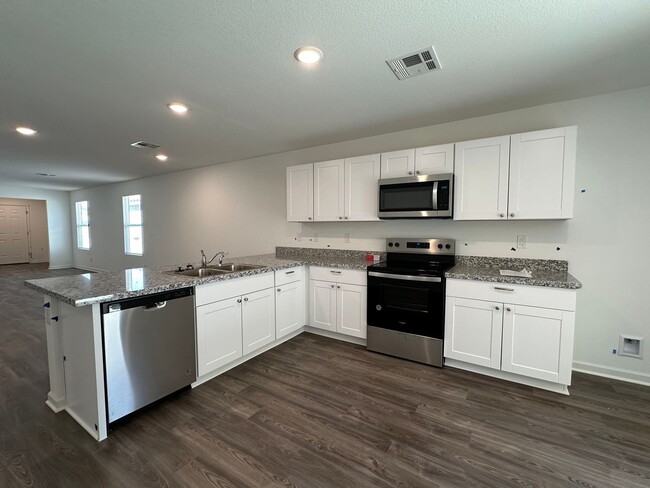 Building Photo - Move In Special! $300 Off Per Month for Fi...