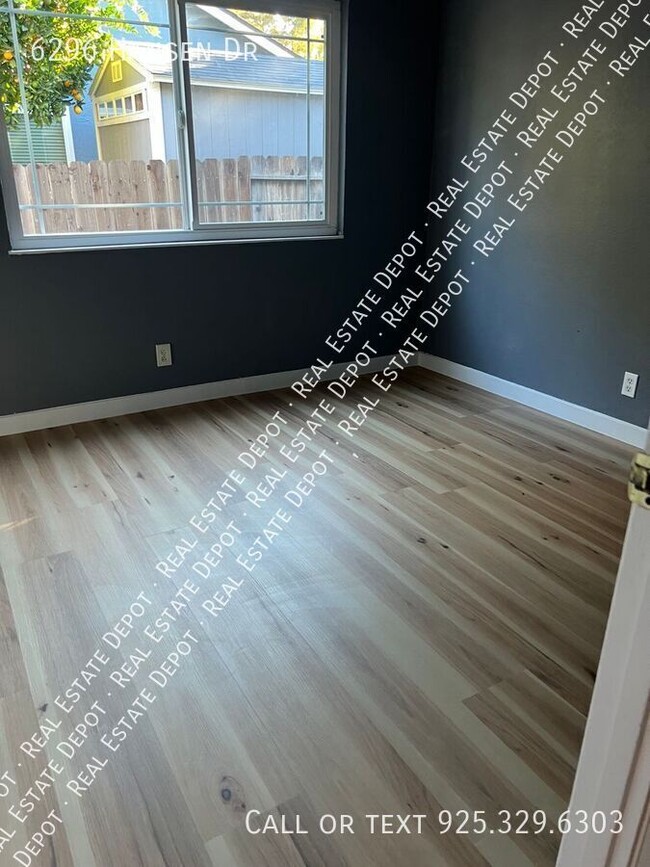 Building Photo - 6296 Hansen Dr