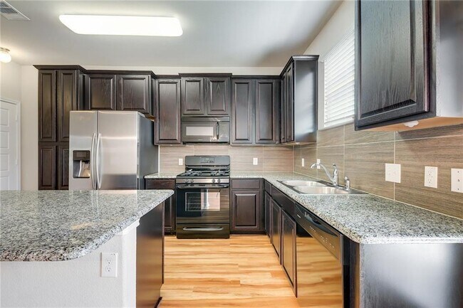 Building Photo - 413 N Heatherwilde Blvd