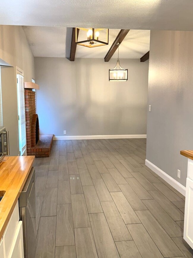 Building Photo - Charming 3 bedroom in NE Albuquerque. Osuna/San Pedro area near San Mateo. Refrigerated Air! 2 Ca...