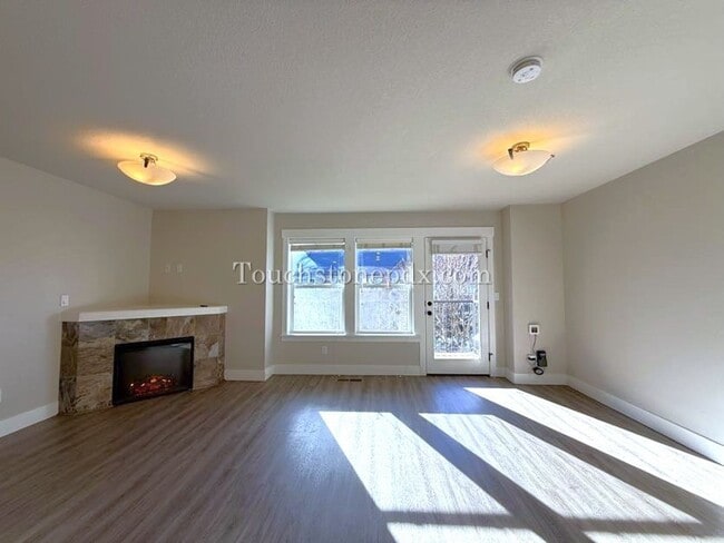 Building Photo - Modern Open Concept 3 Bedroom Home with Balcony and Attached Garage