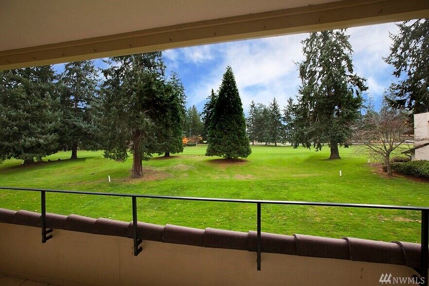 View of the Inglewood Golf Course 9th fairway from the covered deck - 16929 Inglewood Rd NE