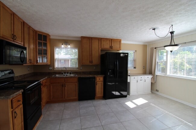 Building Photo - Award winning schools. Stunning home.  Centrally Located. One car garage/fenced in back yard.