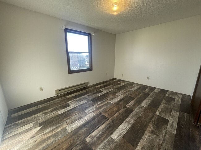 Building Photo - Two bedroom, one and bathroom townhome loc...