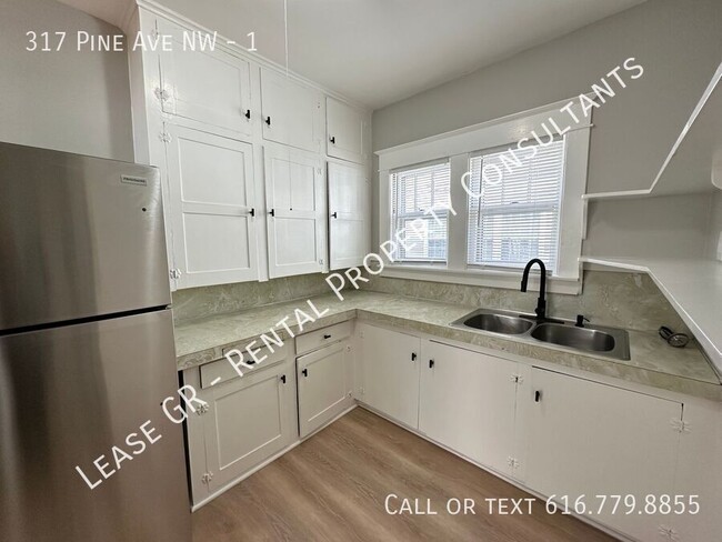 Building Photo - Updated lower 2 bedroom on the West side o...