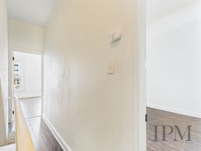 Building Photo - Available Now! Spacious 5 Bedroom Home Loc...