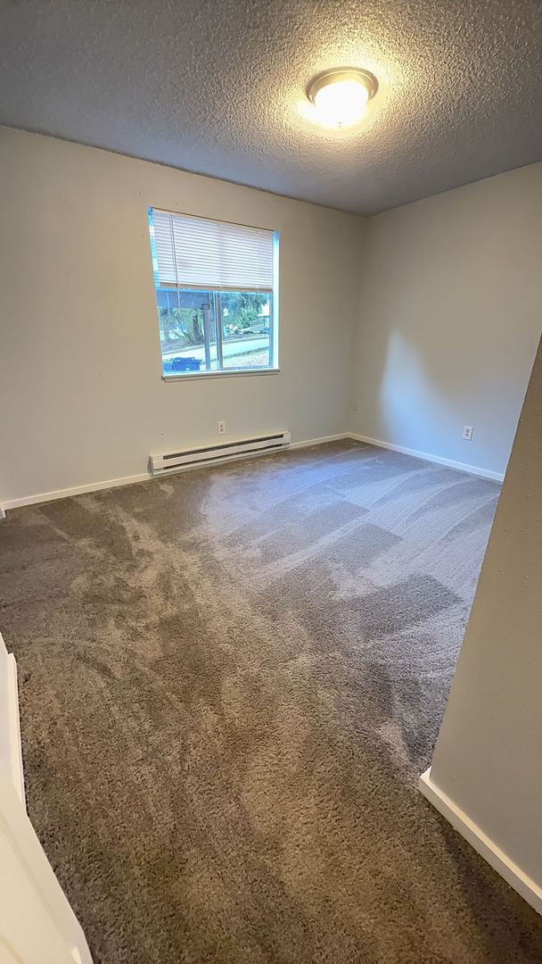 Building Photo - Ground-Level Unit in a Fourplex Near Tacoma Mall