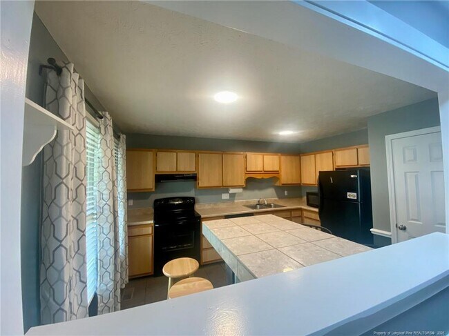 Building Photo - 5681 Pepperbush Dr