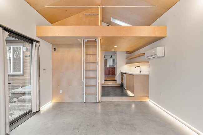 Building Photo - Beautiful, modern 4-bdrm/2-bath home in Concordia—Private, urban sanctuary w/ flex spaces