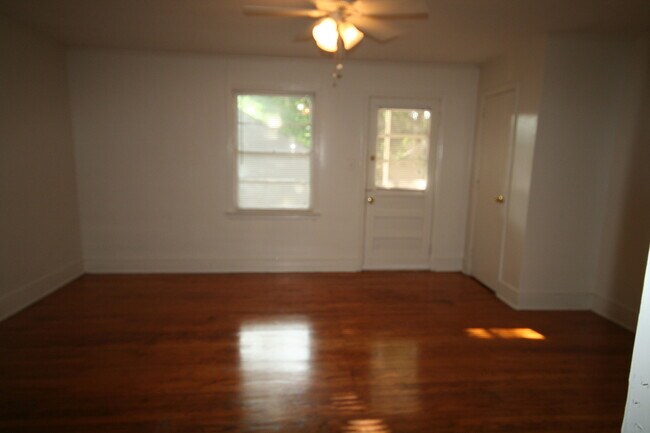 Building Photo - Spacious Walltown Duplex with All Appliances and Fenced Backyard!