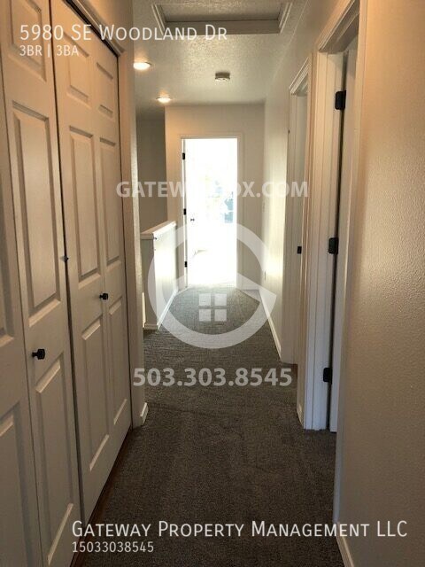 Building Photo - 5980 SE Woodland Dr