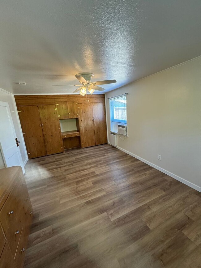 Building Photo - Charming Updated 2 Bedroom Home with Huge Backyard, A/C & Owner-Paid Landscaping