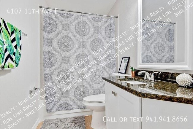 Building Photo - 4107 11th Ave E