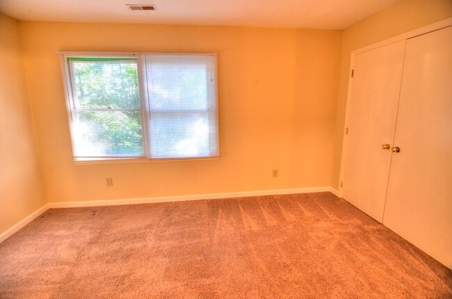 Building Photo - Walk to Downtown Carrboro From This End Unit Townhome!
