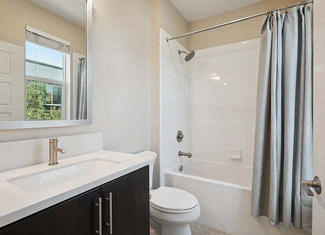 Building Photo - Tucked within the Hollywood Hills in a gated community