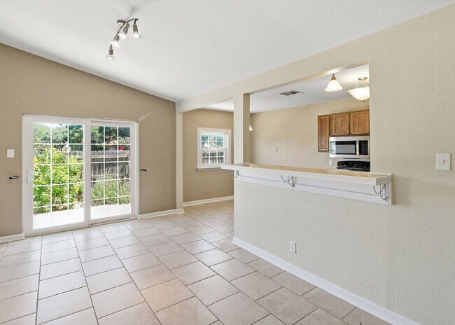 Building Photo - Corner-Lot Garden Home with a Private Patio.