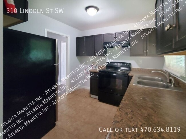 Building Photo - 310 Lincoln St SW