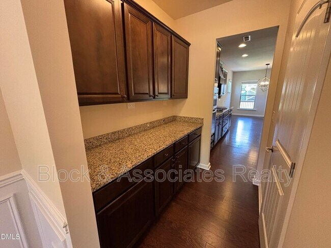 Building Photo - 1009 Magnolia Blossom Ln