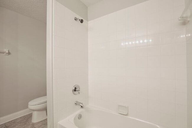 Building Photo - AGENT SHOWINGS ONLY! Stunning 3/2.5 Corner Unit Townhome with a Spacious 2 Car Garage in the Gate...