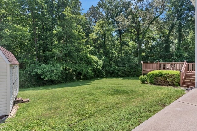 Building Photo - One acre lot with first floor suite in bea...