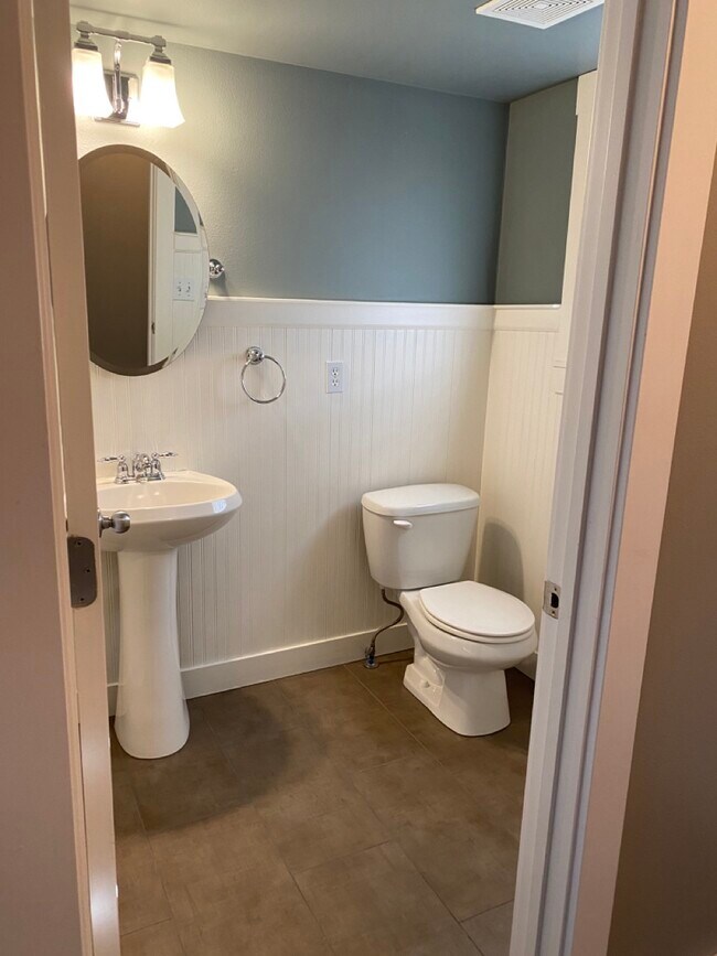 Main floor 1/2 bath - 8708 N. Cherry Ln.