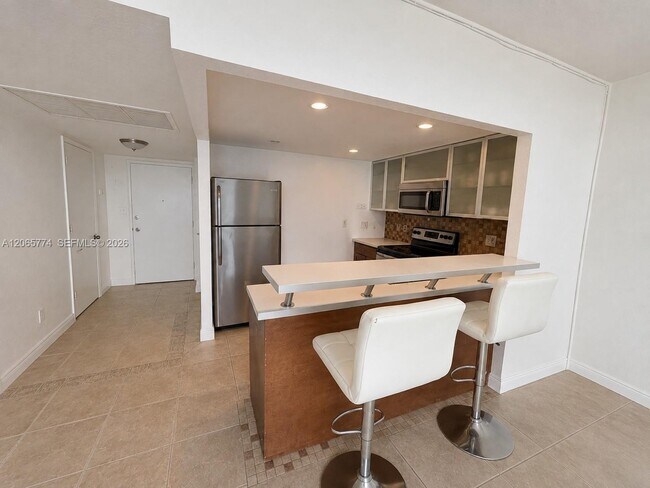Building Photo - 5401 Collins Ave