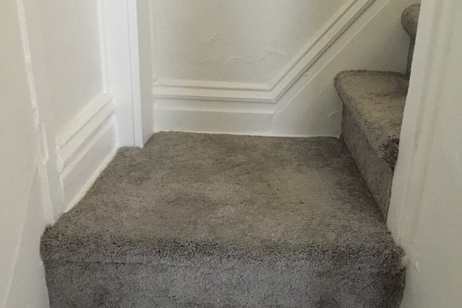 Carpeted stairs - 618 N Atlantic Ave