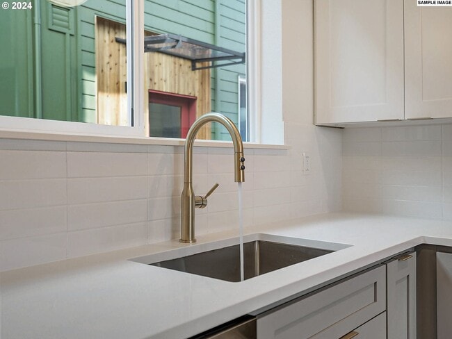 Building Photo - Inviting Home with Open Living & Stainless Steel Kitchen