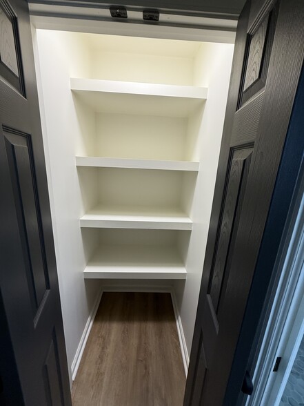 Linen closet in primary water closet - 117 Battery Way