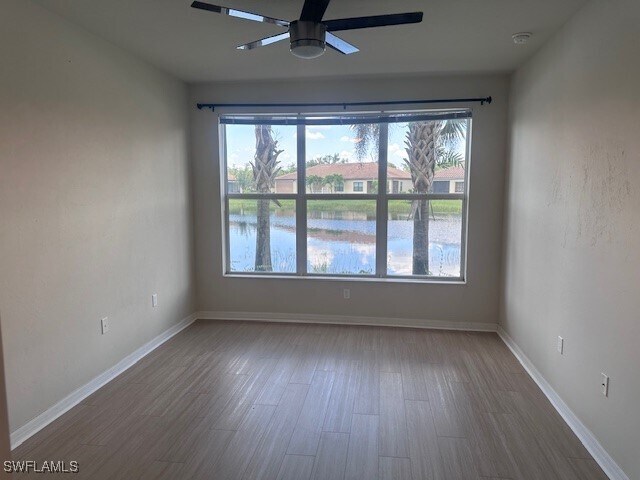 Building Photo - 10339 Whispering Palms Dr