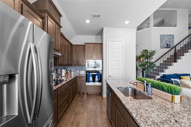 Building Photo - 6017 Mango Dr