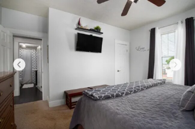 Building Photo - 4 Bedroom with a Hot Tub in the heart of t...