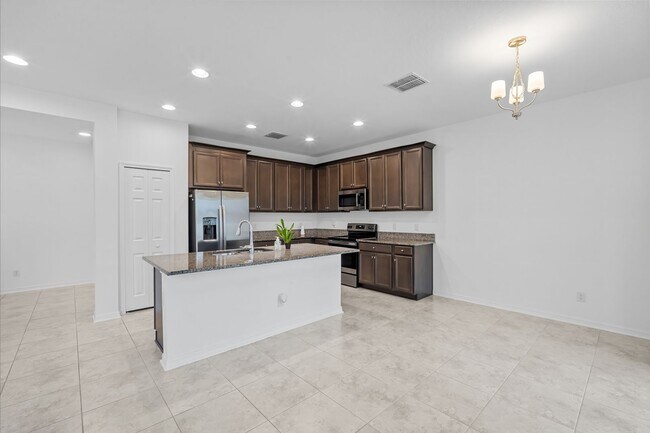 Building Photo - Now Available! 3 Bedrooms + Den, 2.5 Baths...