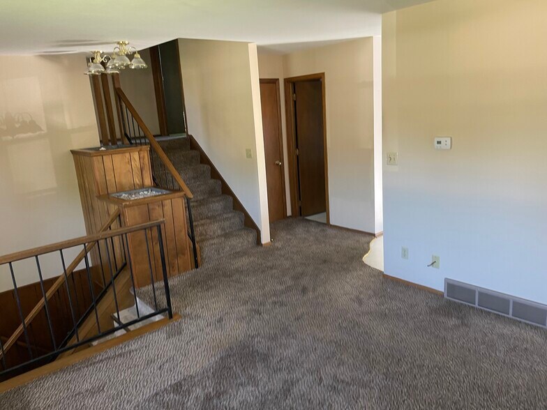 Living room and stairs - 615 Harrison St