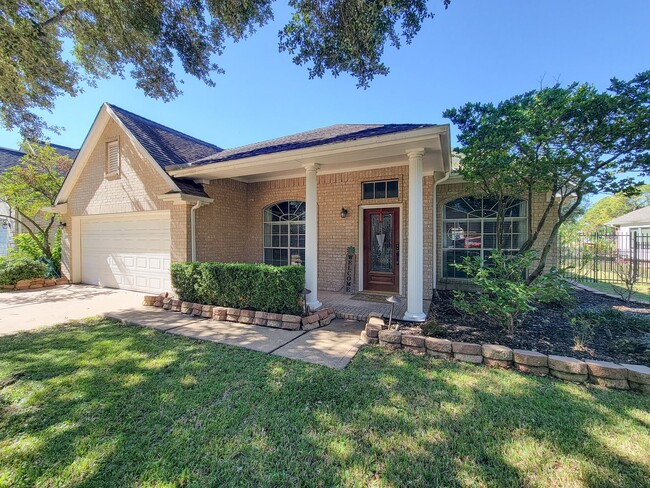 Building Photo - Welcome home to this charming 4-bedroom, 3-bathroom brick house in the desirable Stone Gate commu...