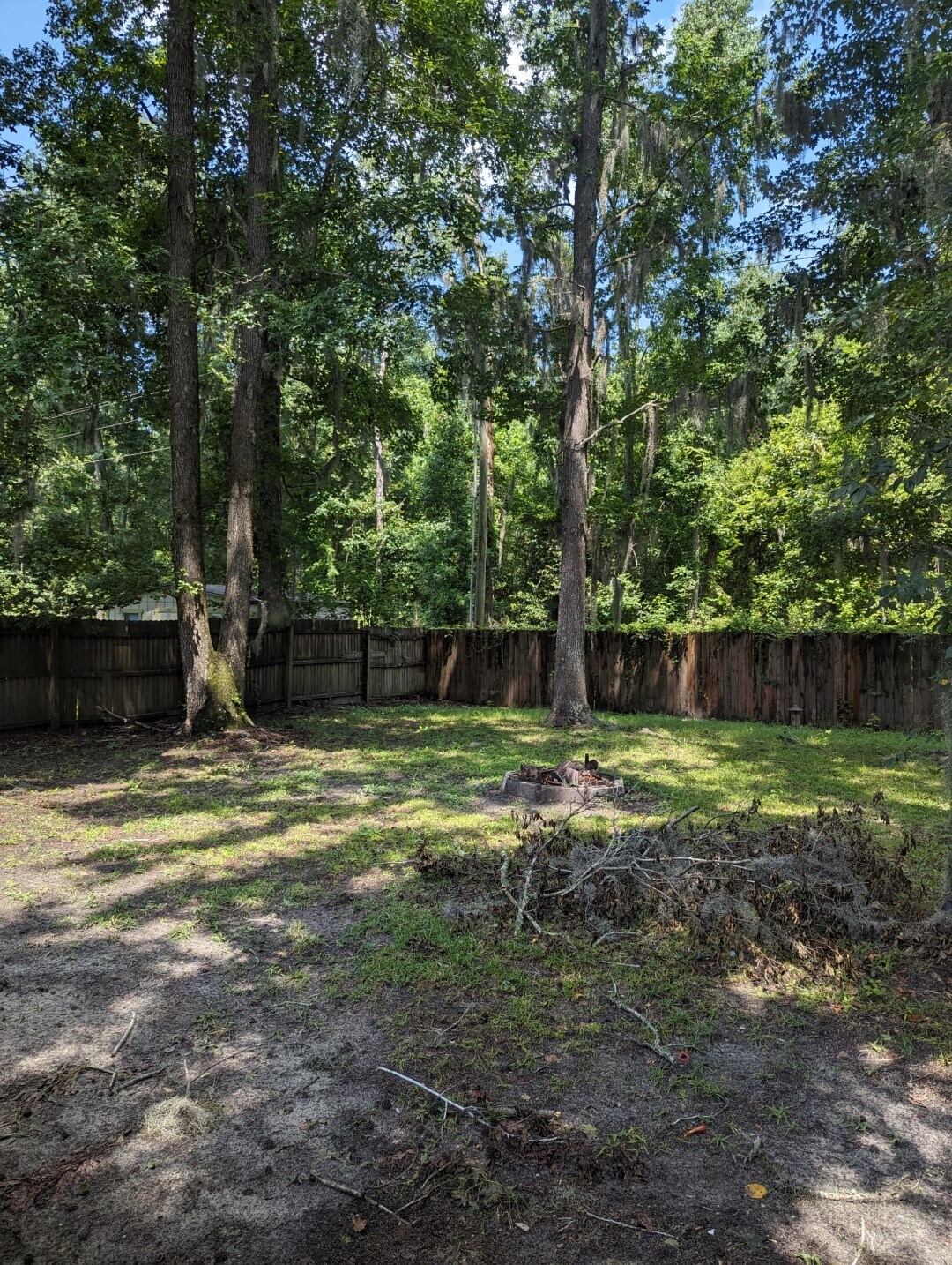 Backyard with firepit - 110 W White Hawthorne Dr