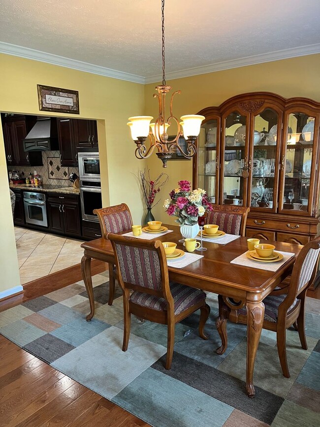 Building Photo - Updated & Landscaped 4 Bedroom, 4 Bath Hom...
