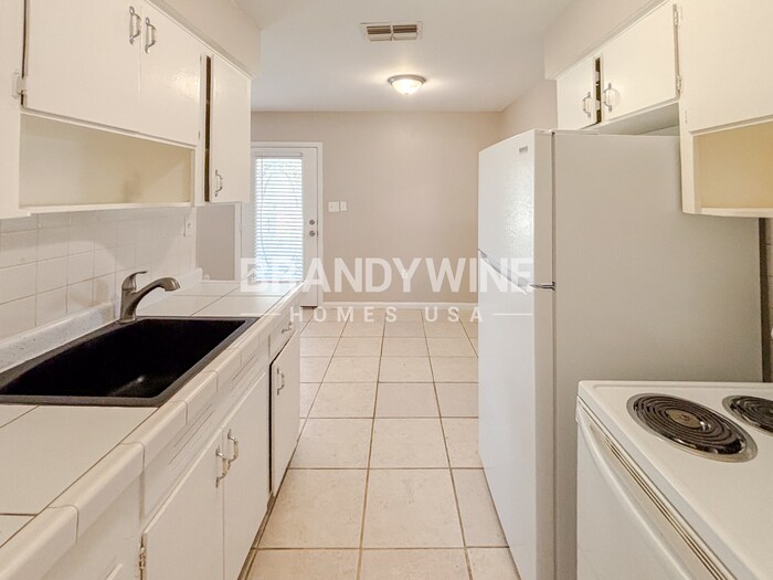 Building Photo - 6028 Flora Terrace