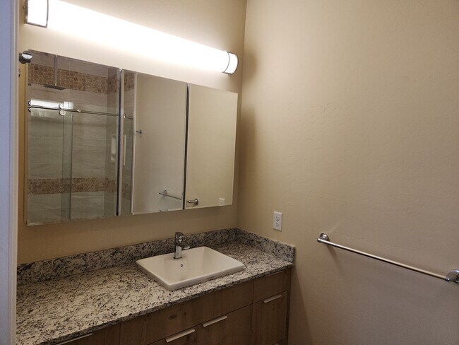 Building Photo - NEW Bison Cove E4 End Unit Now Available