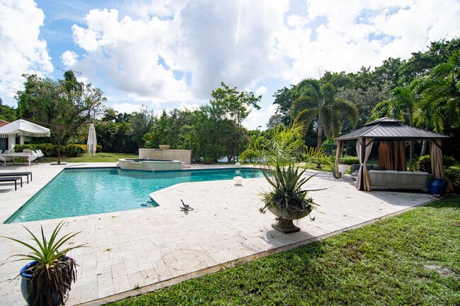 Building Photo - 8208 Twin Lake Dr