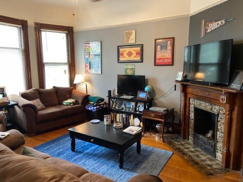 Living room with gas fireplace - 1560 E Irving Plz