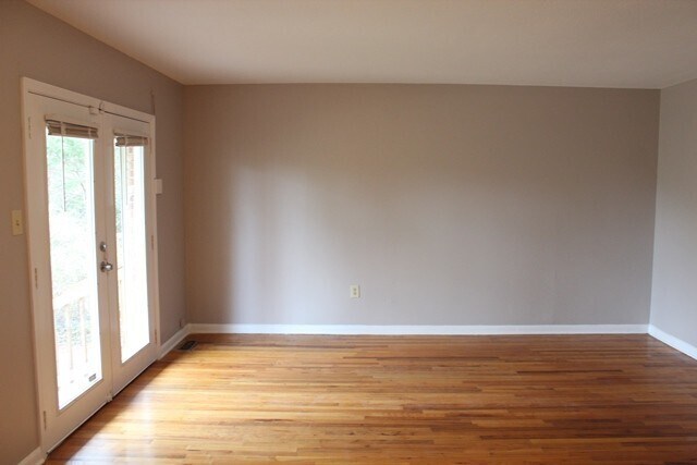 Building Photo - Welcome to this beautiful brick home nestl...