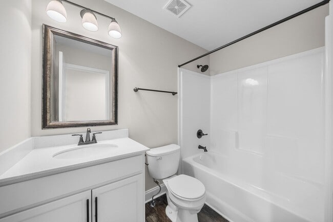 Building Photo - Pet Friendly Three Bedroom with Bonus!