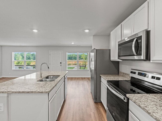 Building Photo - ASK ABOUT RENT SPECIAL! Fantastic Location – Spacious 3 Bedroom Townhome with Rear-Entry Garage!