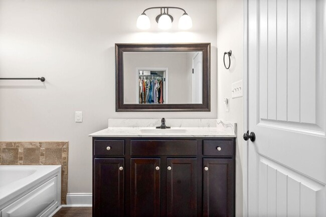 Building Photo - Pet Friendly Three Bedroom with Bonus!