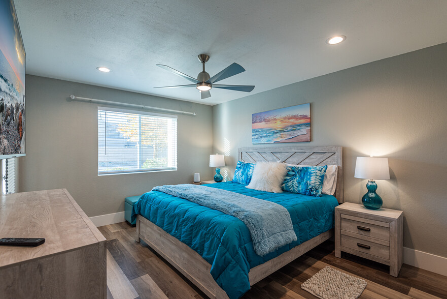 King Bedroom, has door to the patio. - 4150 E Cactus Rd